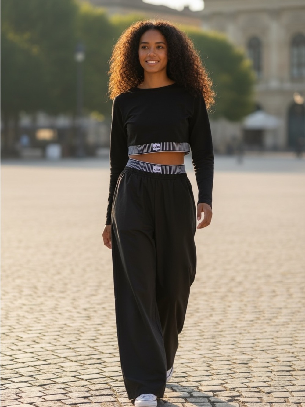 Black Long-Sleeve Jumpsuit with Striped Waist Detail